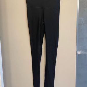 Lululemon patterned legging laser cut detail on lower leg